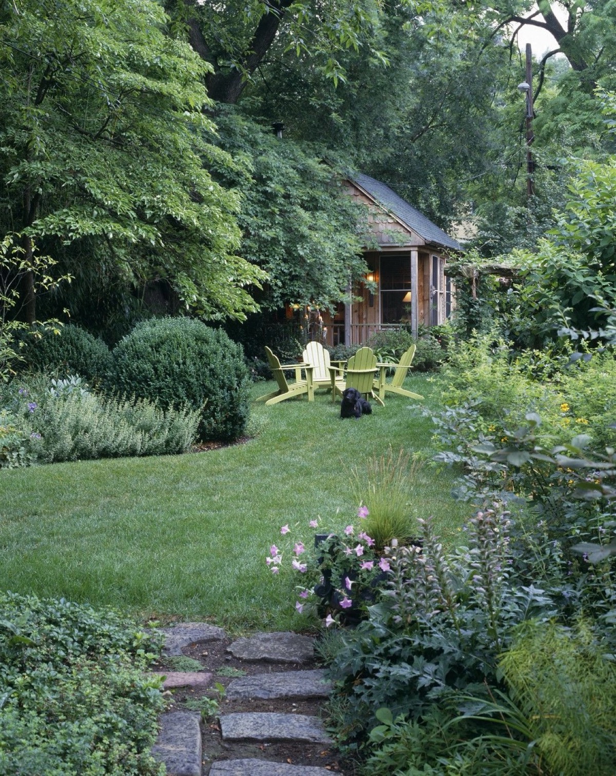 A garden path leading to a peaceful cottage retreat
