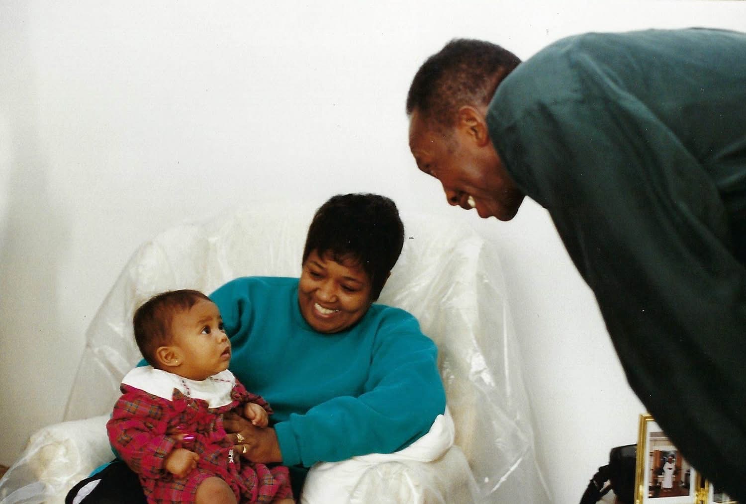 Sophia as a baby with her grandmother, Elder Jessie Darrough, and her grandfather
